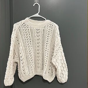 Adorable Forever 21 hallow sweater. I am 5’3”. It fits me well!